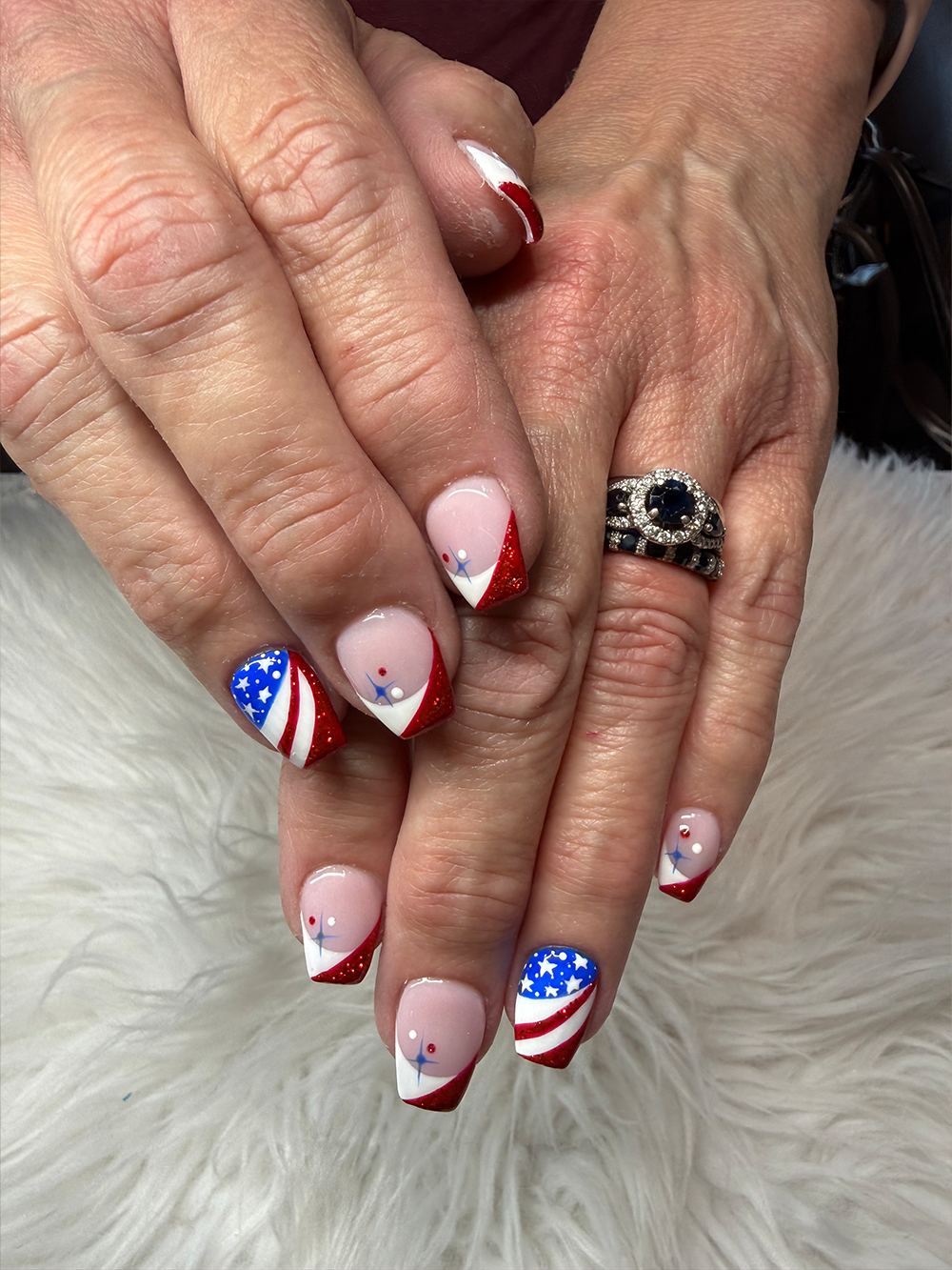 Red white and blue square nails with stars, stripes, glitter French tips and patriotic nail art by Chic Nail and Head Spa