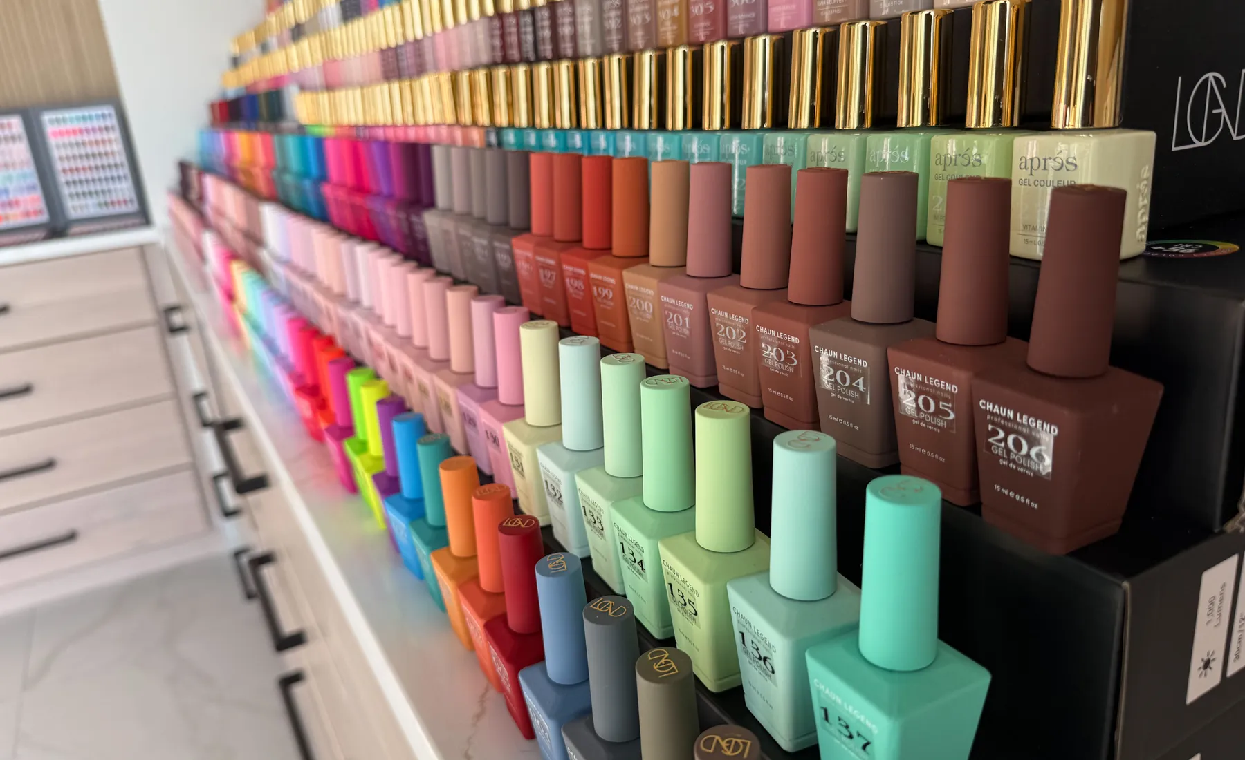 A wall of nail polish colors at Chic Nail & Head Spa